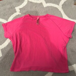 Pink SKIMS t- shirt